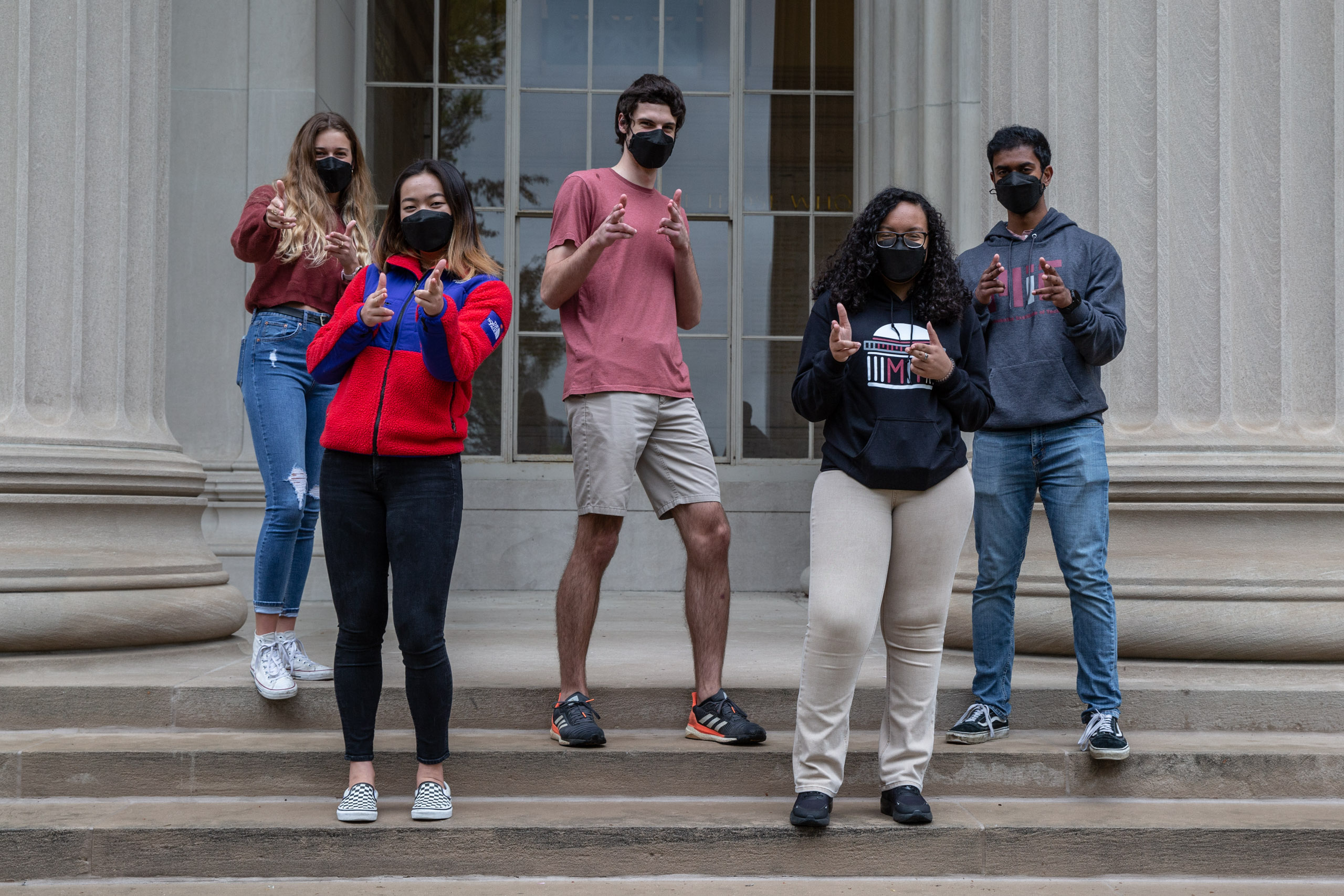 MIT student in Toy design class 2.00b Spring 2021 remove their masks. Series by Photographer Danny Goldfield.