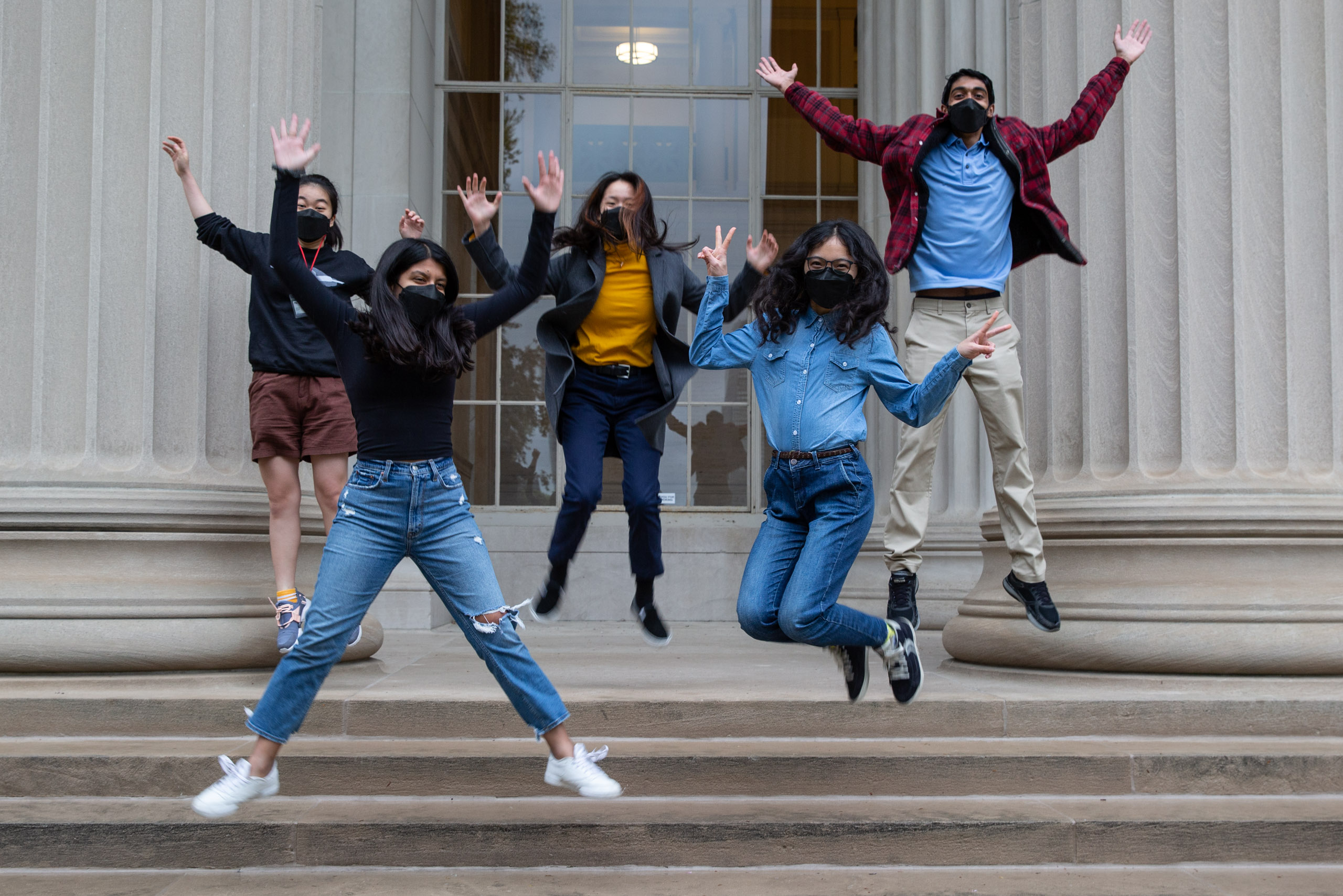 MIT student in Toy design class 2.00b Spring 2021 remove their masks. Series by Photographer Danny Goldfield.