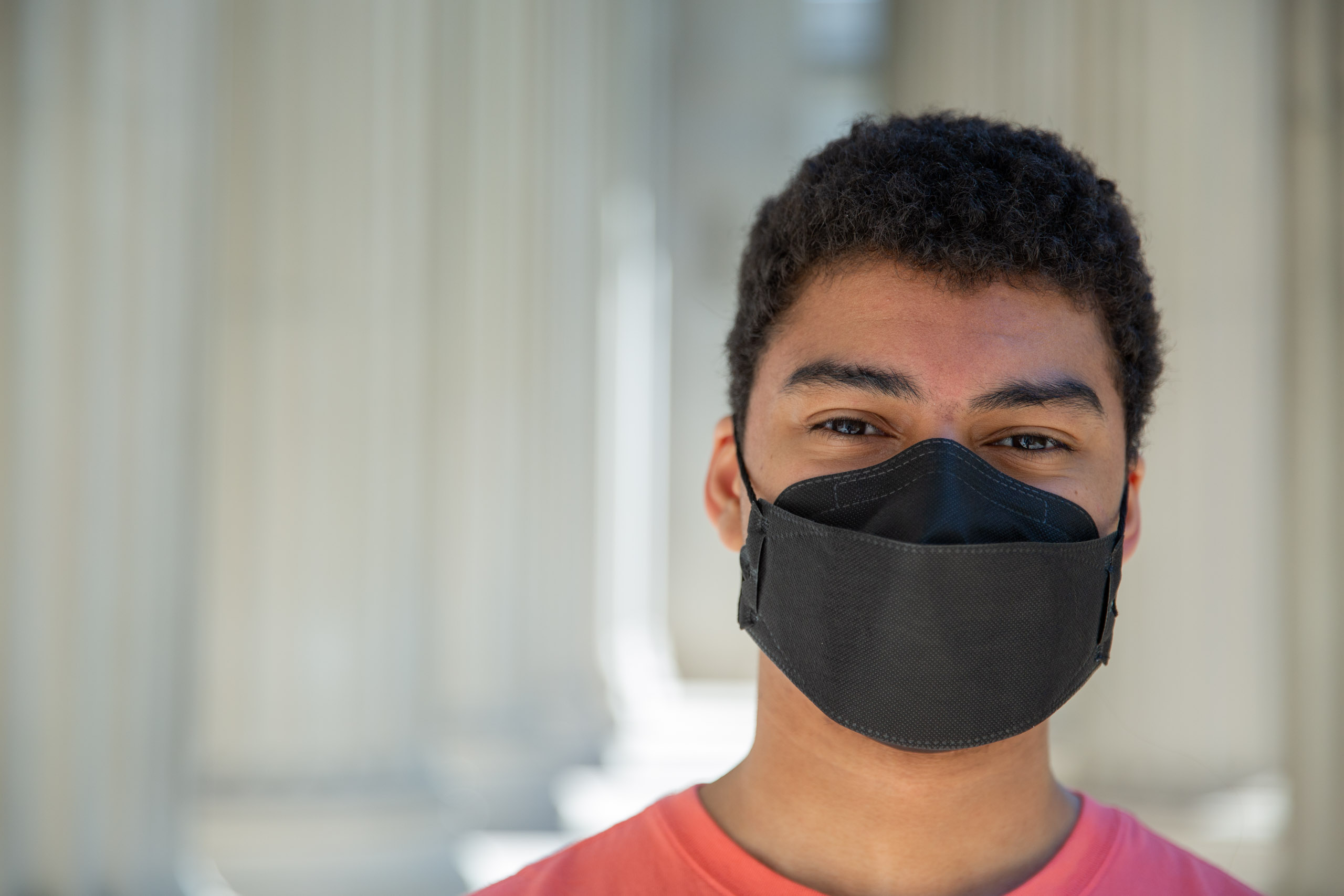MIT student in Toy design class 2.00b Spring 2021 remove their masks. Series by Photographer Danny Goldfield.